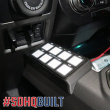 Load image into Gallery viewer, '17-20 Ford Raptor SDHQ Built Switch Pros SP-9100 Flow Through Center Console Keypad Mount